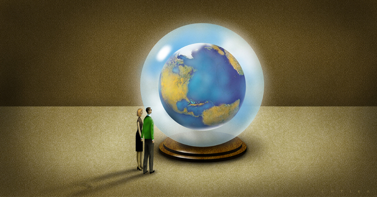 2 people standing next to a globe